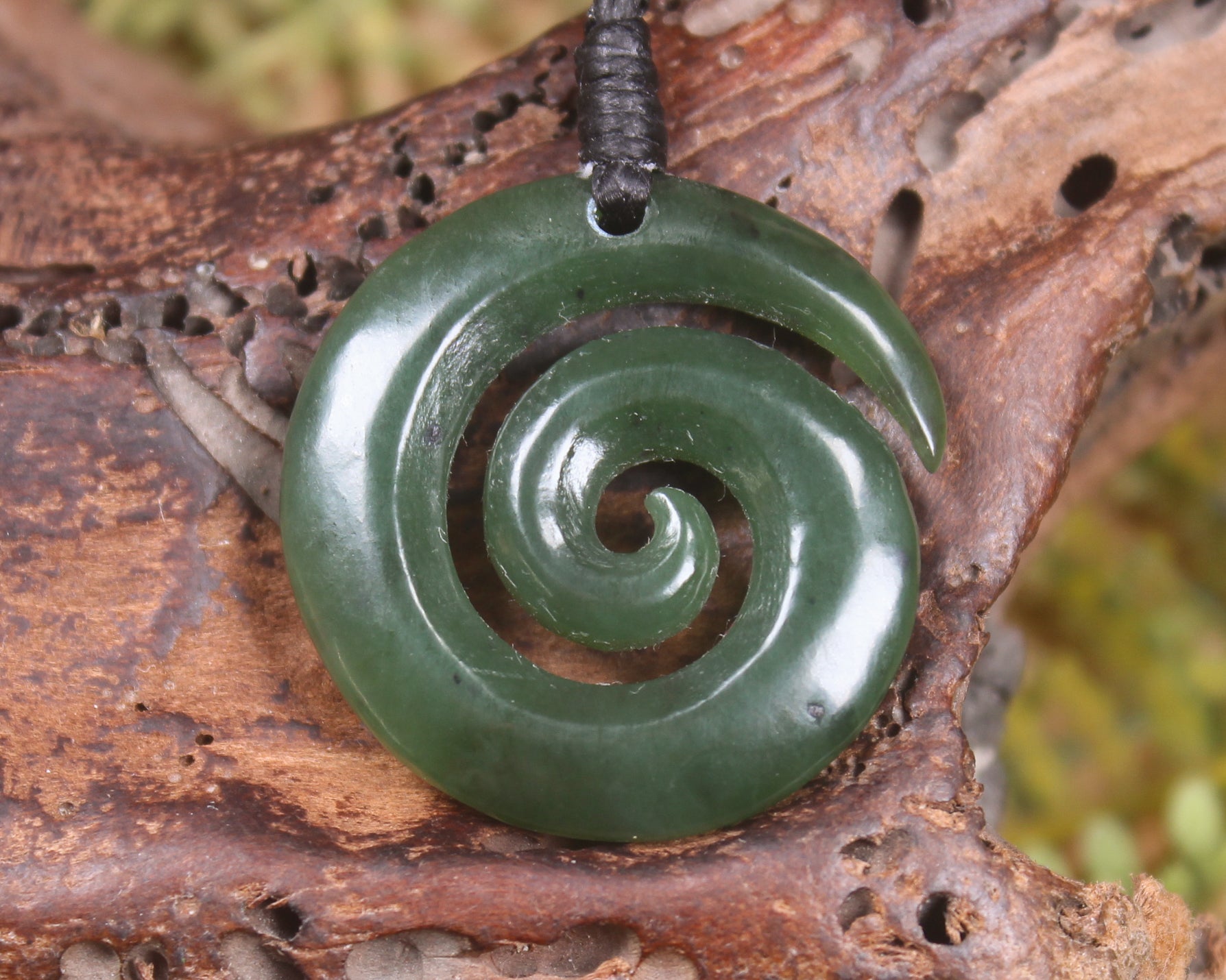 Koru carved from Rimu Pounamu - NZ Greenstone