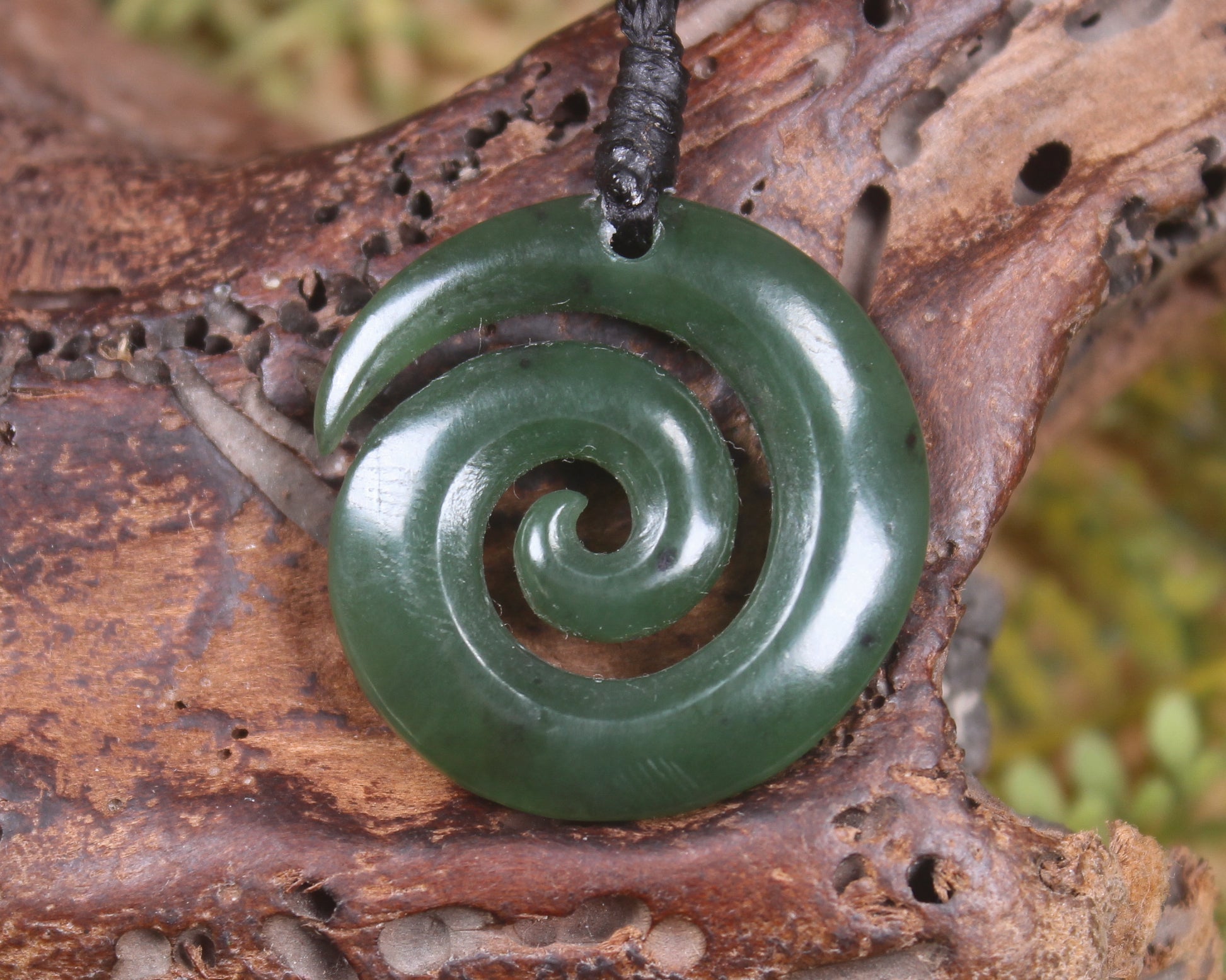 Koru carved from Rimu Pounamu - NZ Greenstone
