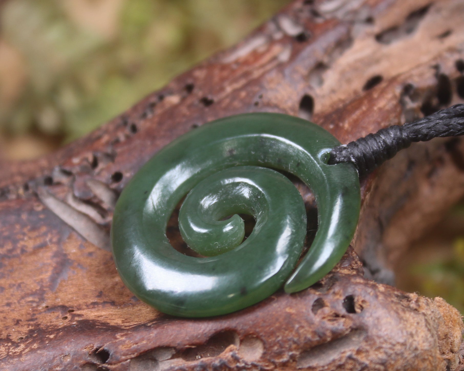 Koru carved from Rimu Pounamu - NZ Greenstone