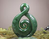 Kawakawa Pounamu Koru Twist set on a Pounamu base - NZ Greenstone