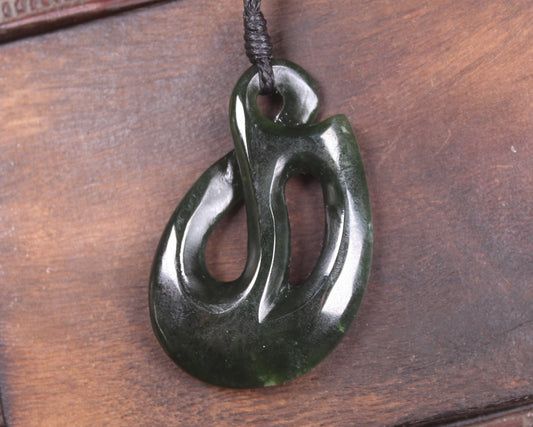 Twist Pendant carved from Kawakawa Pounamu - NZ Greenstone