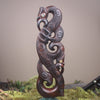 Manaia sculpture carved from recycled wood