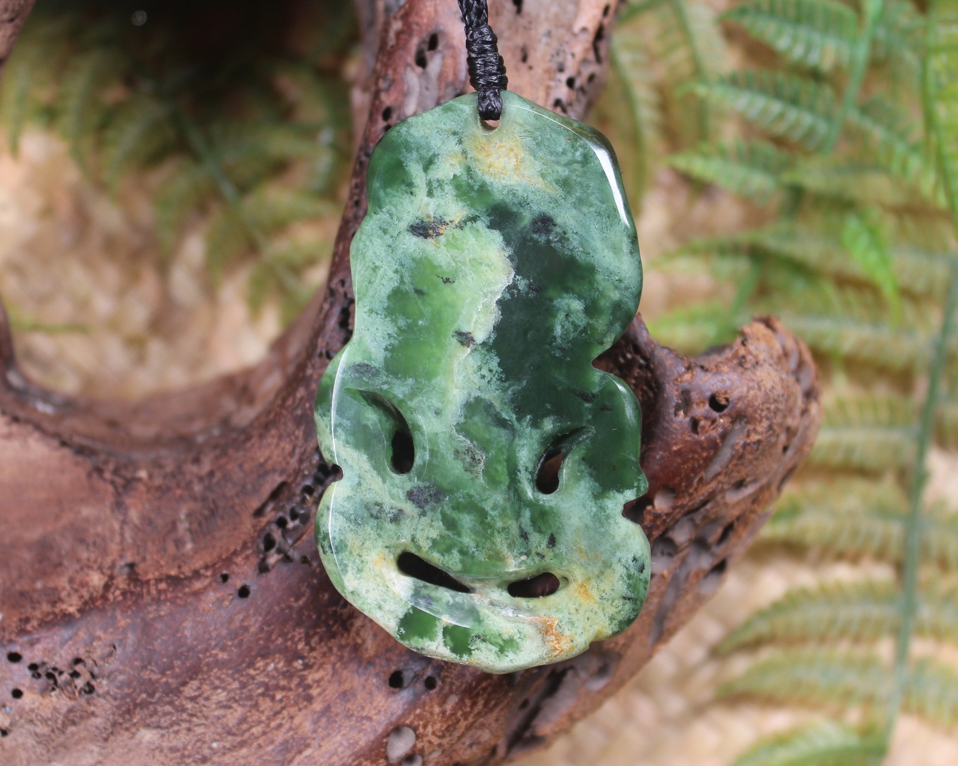 Hei Tiki carved from Flower Jade Pounamu - NZ Greenstone