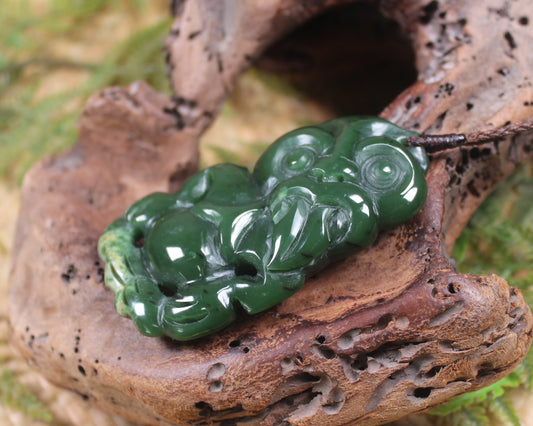 Hei Tiki carved from Flower Jade Pounamu - NZ Greenstone