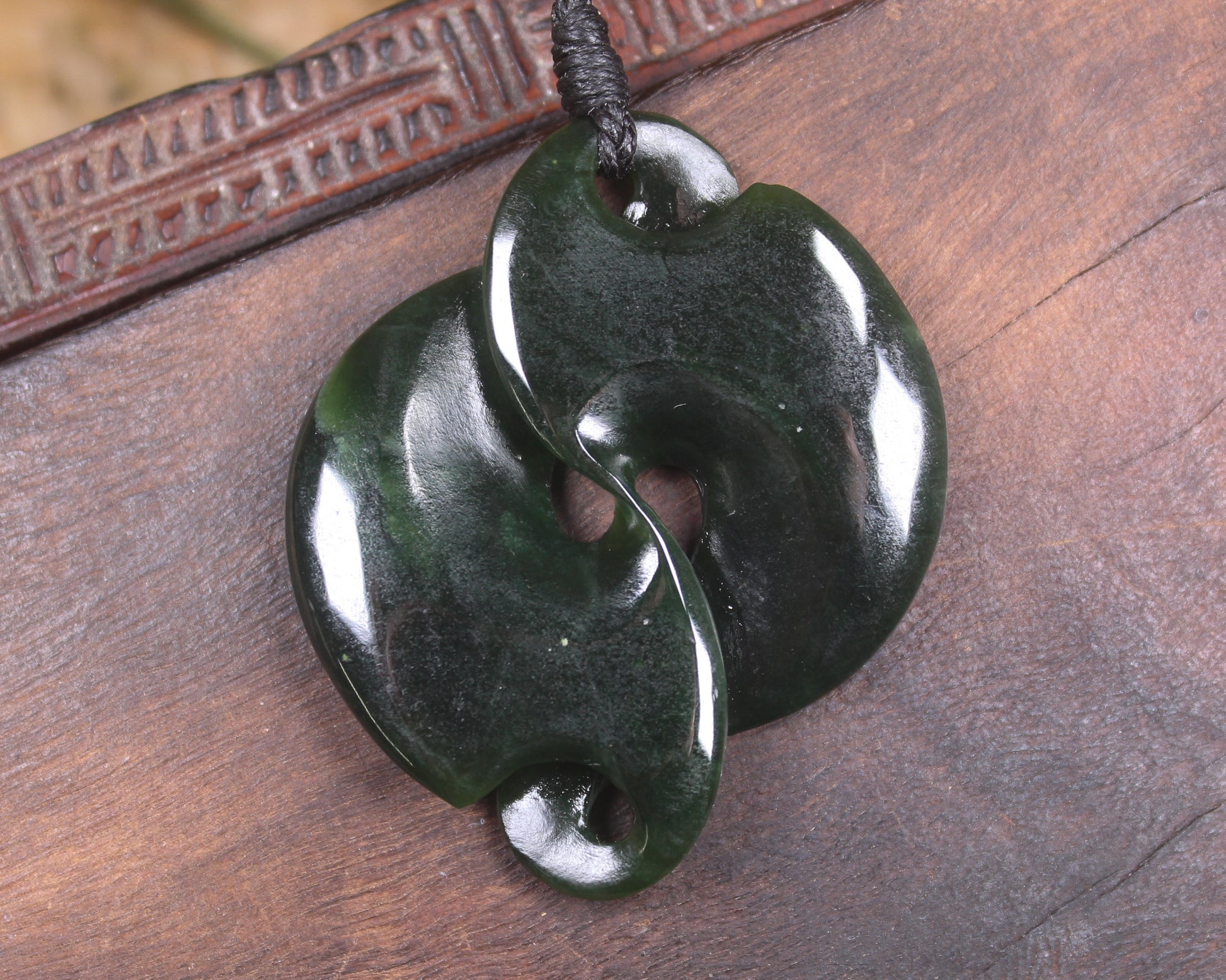 Koru Twist or Pikorua carved from Kawakawa Pounamu - NZ Greenstone