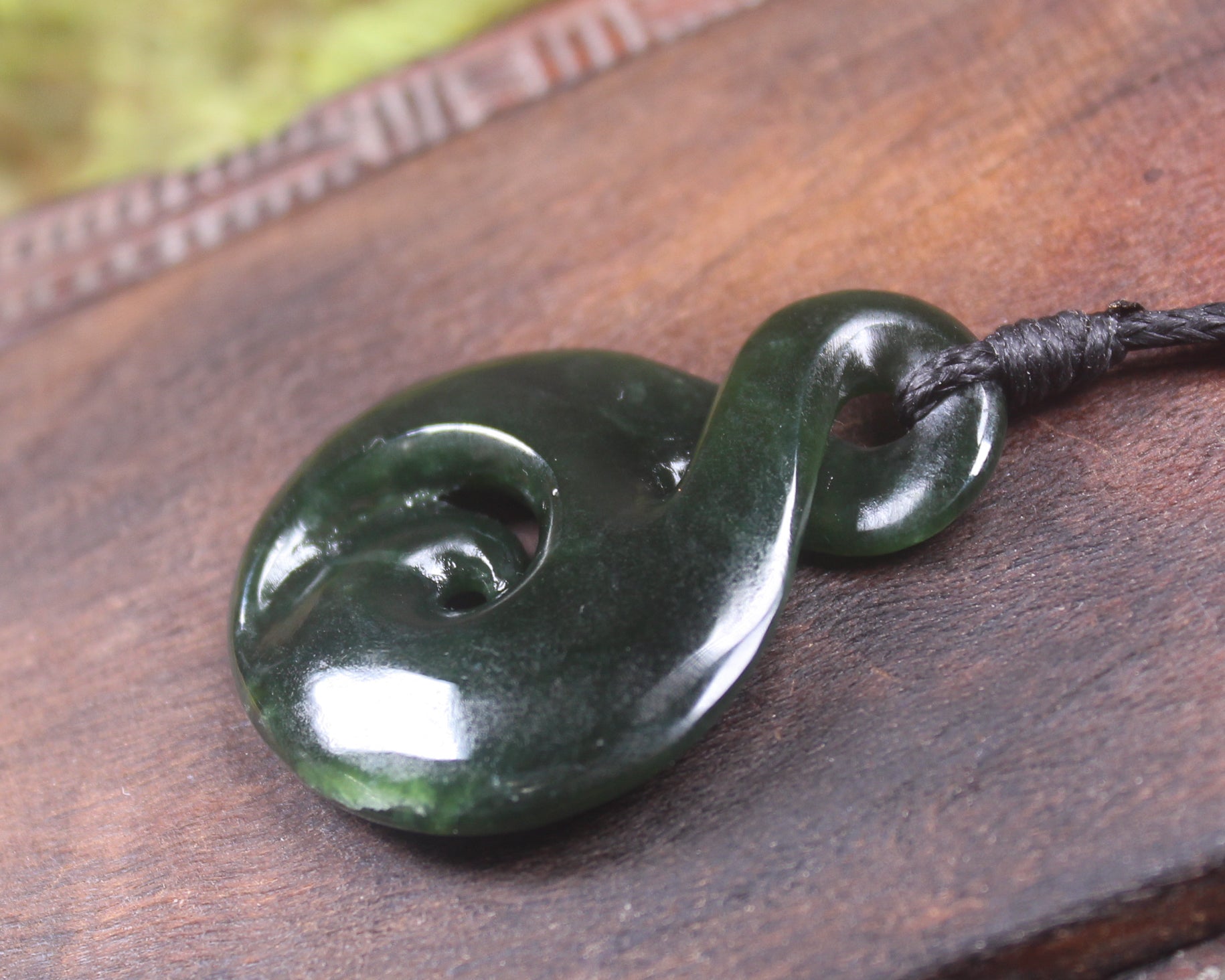 Koru Twist carved from Kawakawa Pounamu - NZ Greenstone