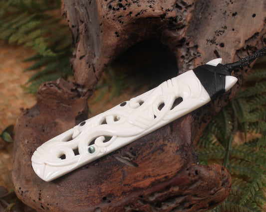 Toki or Adze with Koru carved from Beef Bone