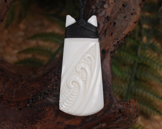 Toki or Adze with Koru carved from Beef Bone