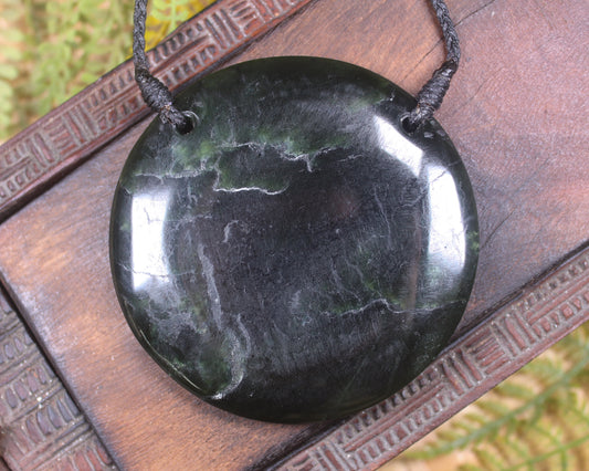 Porowhita or Pi Stone carved from Kawakawa Pounamu - NZ Greenstone