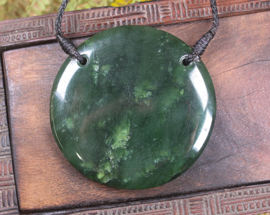 Porowhita or Pi Stone carved from Kawakawa Pounamu - NZ Greenstone