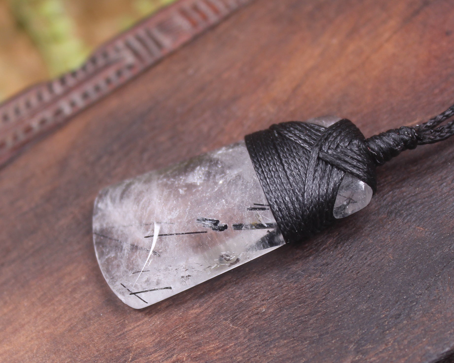 Quartz with Black Tourmaline carved into a Toki or Adze