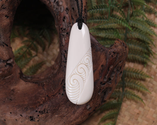 Roimata with Koru carved from beef bone