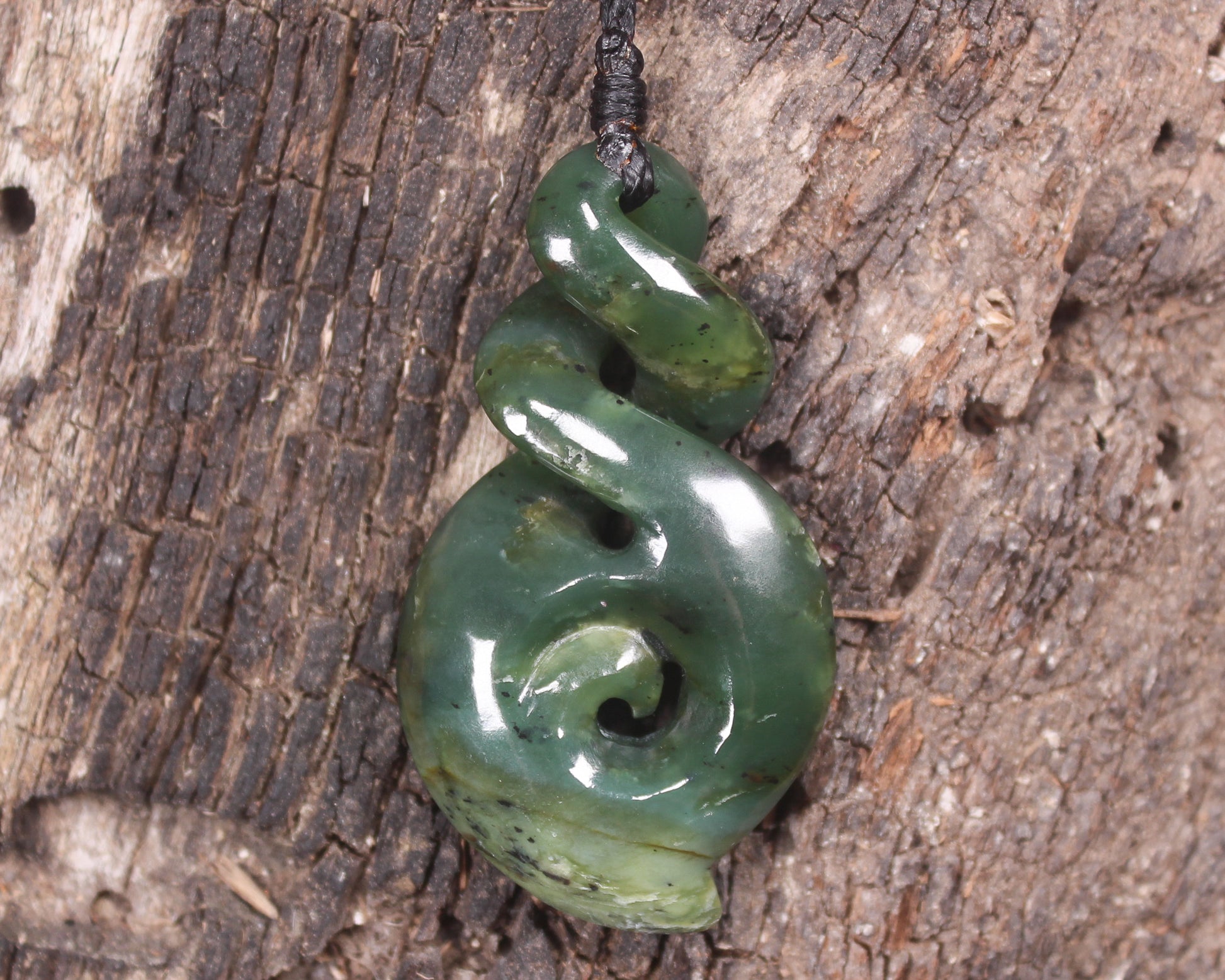 Hapopo Pounamu Koru Twist pendant - NZ Greenstone