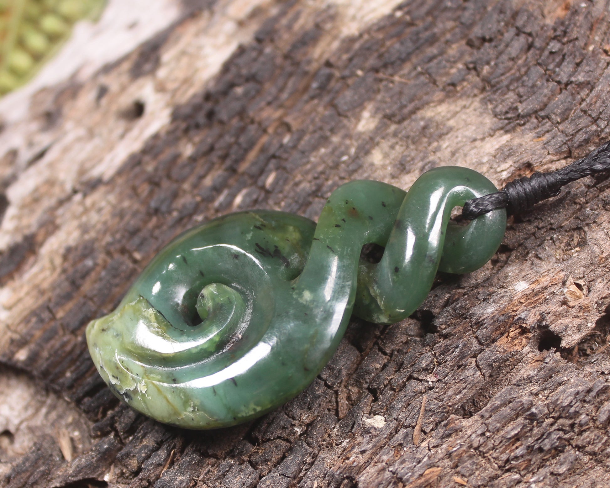 Hapopo Pounamu Koru Twist pendant - NZ Greenstone