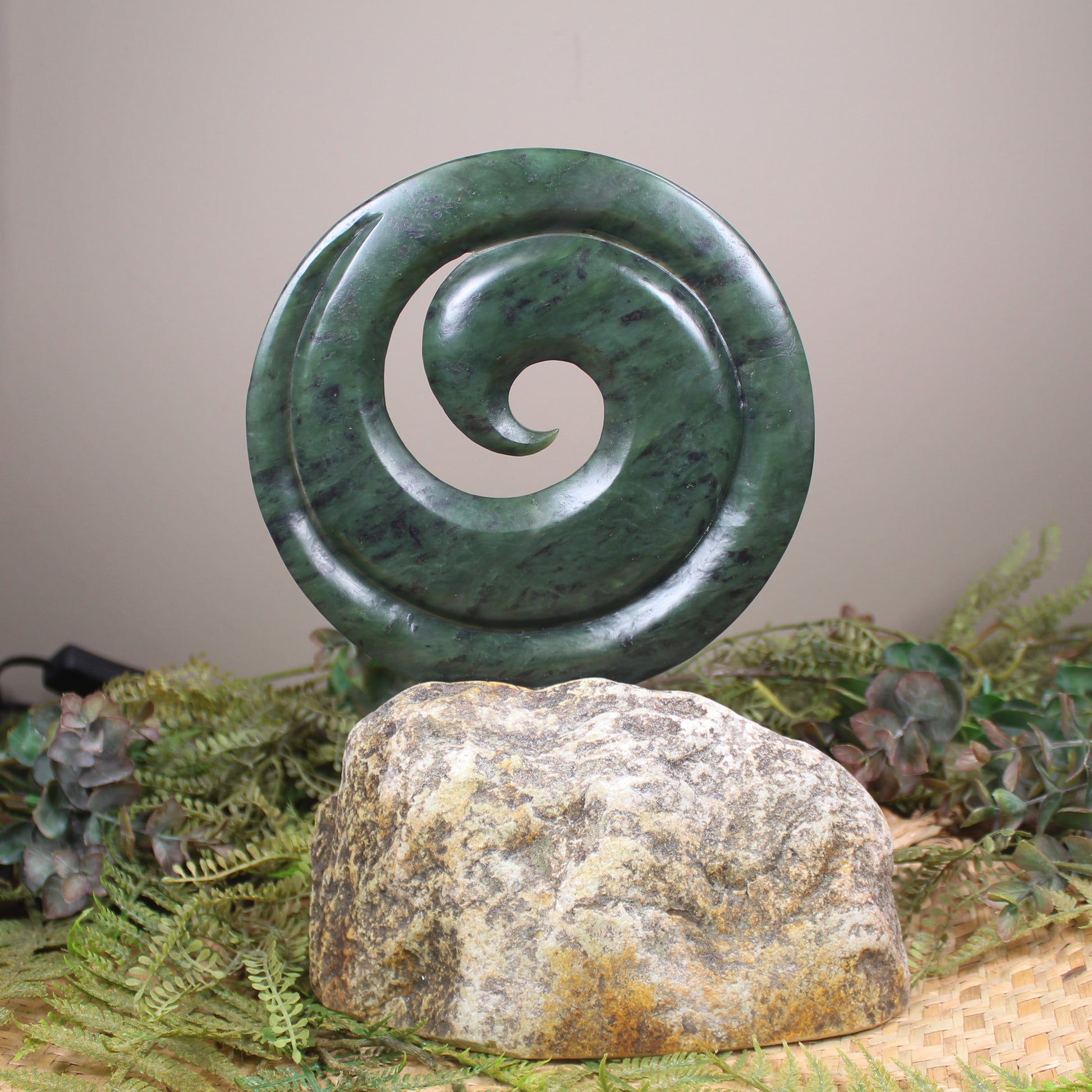 Koru sculpture carved from Rimu Pounamu - NZ Greenstone