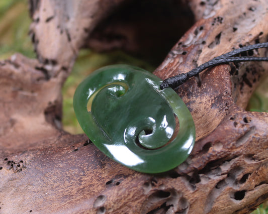 Koru pendant carved from Kawakawa Pounamu - NZ Greenstone