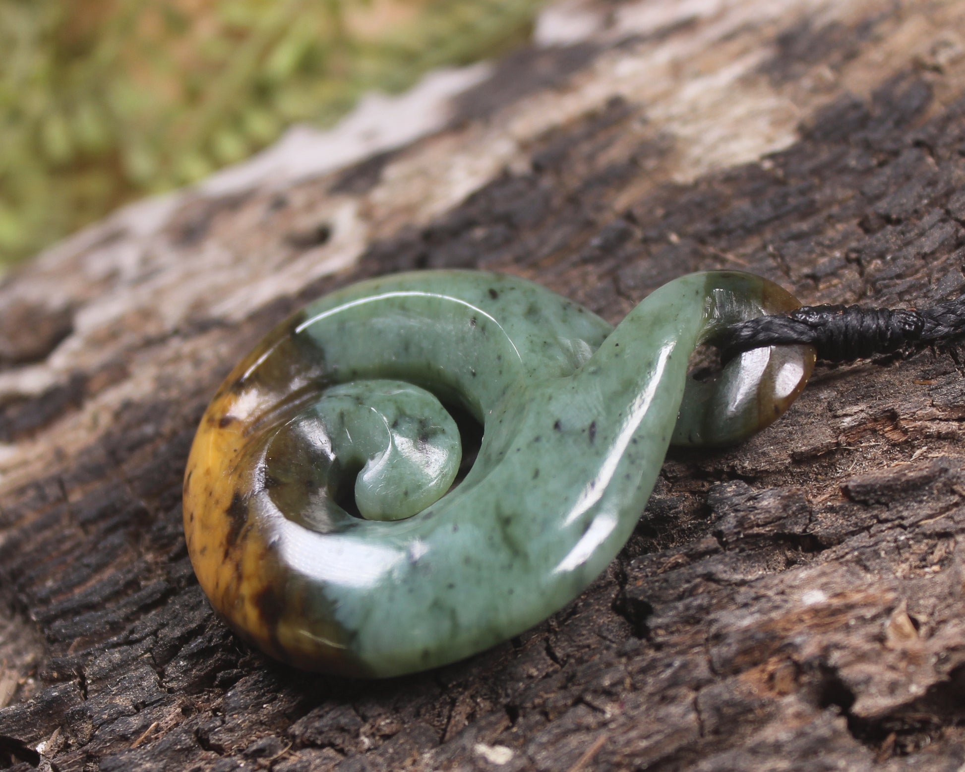Koru Twist carved from Flower Jade Pounamu - NZ Greenstone