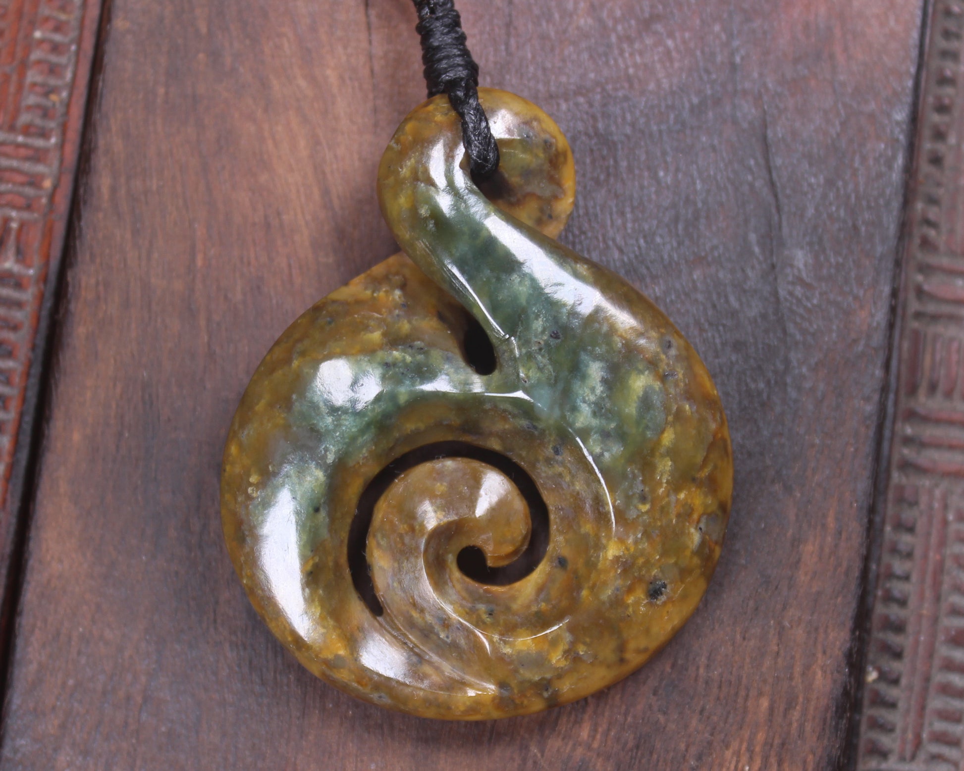 Koru Twist carved from Flower Jade Pounamu - NZ Greenstone