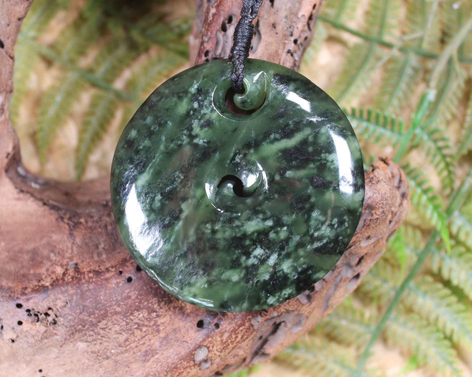 Koru carved from Rimu Pounamu - NZ Greenstone