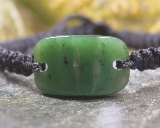 Adjustable cord bracelet with Hapopo Pounamu