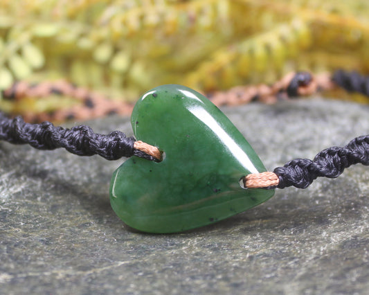 Adjustable cord bracelet with Hapopo Pounamu