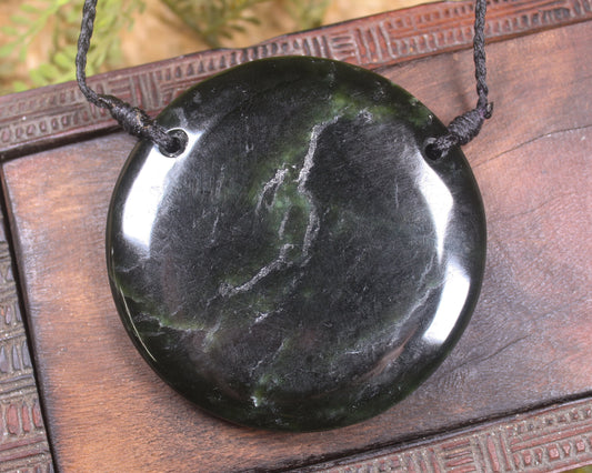 Porowhita or Pi Stone carved from Kawakawa Pounamu - NZ Greenstone