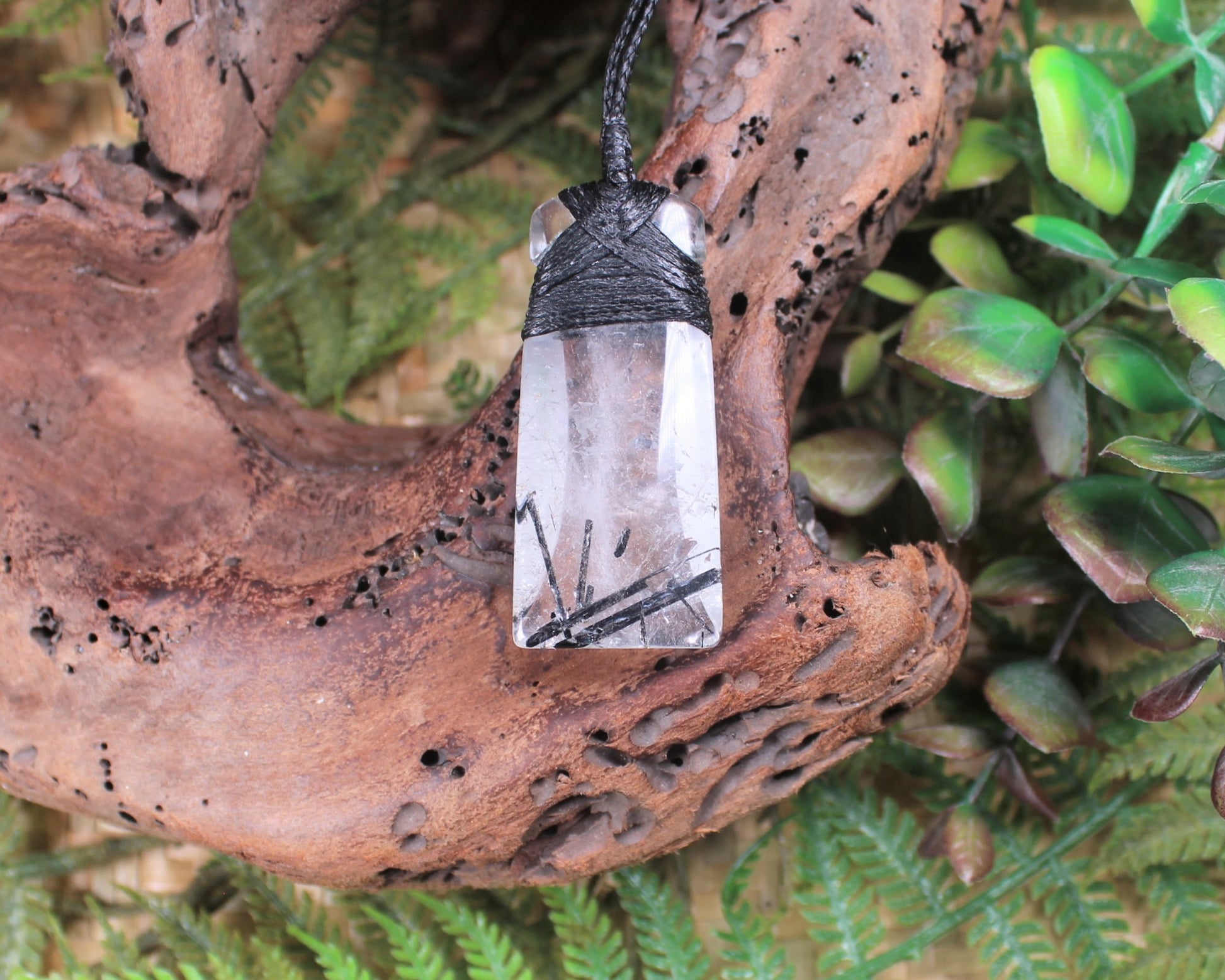 Clear Quartz with Black Tourmaline carved into a Toki or Adze