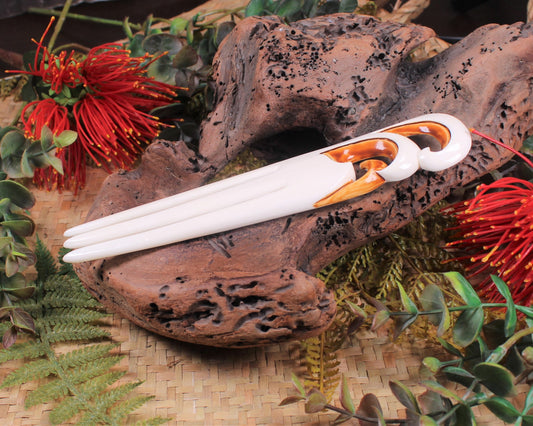 Heru with Koru carved from beef bone