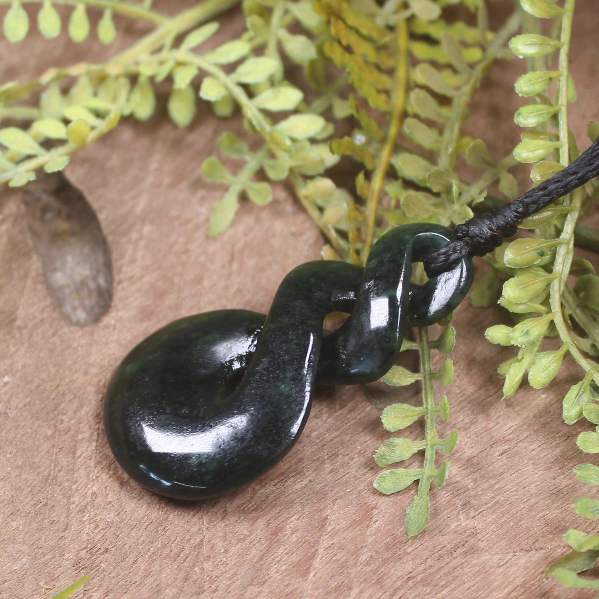 Twist carved from Kawakawa Pounamu - NZ Greenstone