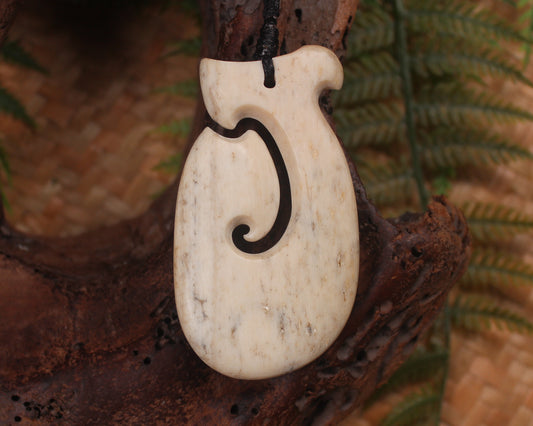 Hei Matau carved from Whale Bone