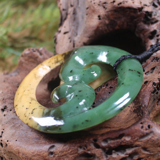 Koru Pendant carved from Flower Jade Pounamu - NZ Greenstone