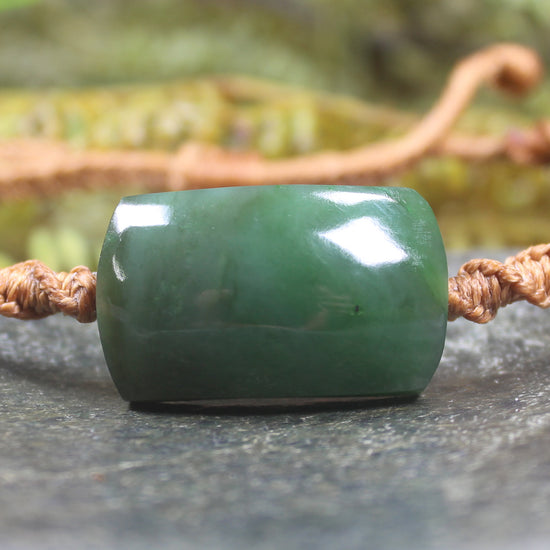 Adjustable cord bracelet with Hapopo Pounamu