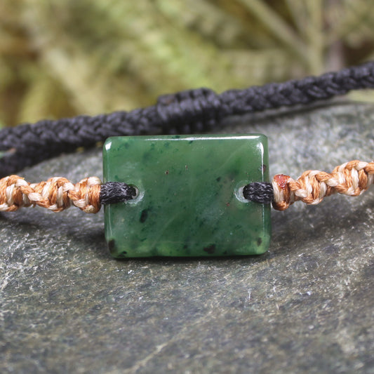 Adjustable cord bracelet with Kawakawa Pounamu