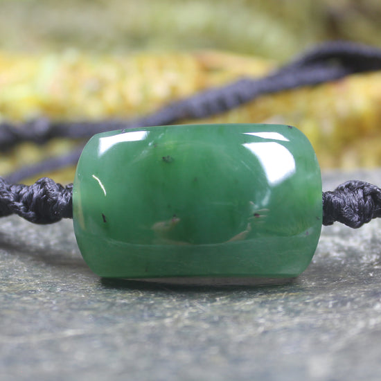 Adjustable cord bracelet with Hapopo Pounamu