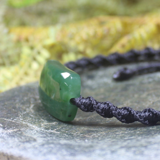 Adjustable cord bracelet with Hapopo Pounamu