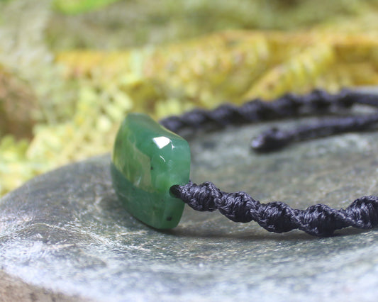 Adjustable cord bracelet with Hapopo Pounamu