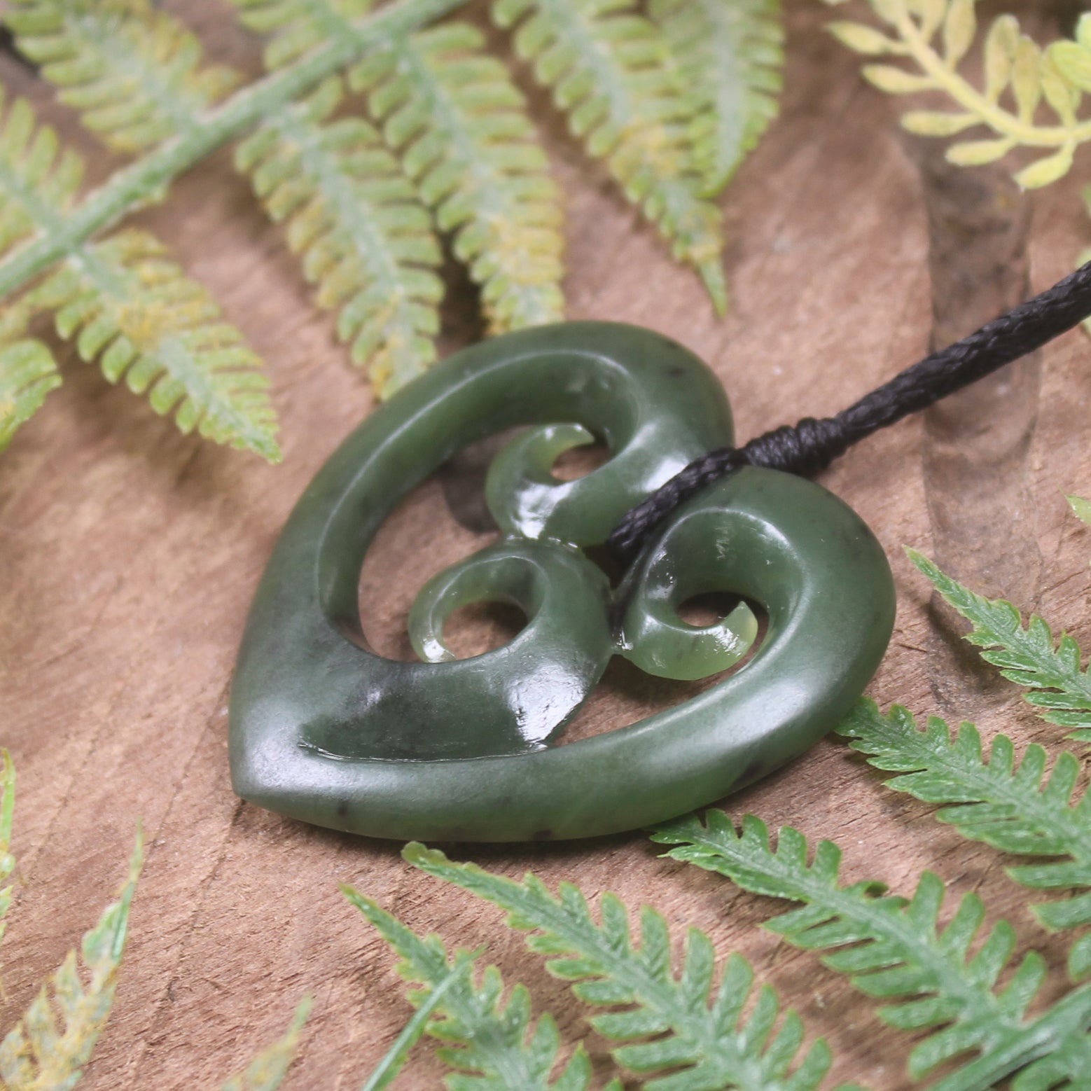 Heart with Koru carved from Hapopo Pounamu - NZ Greenstone