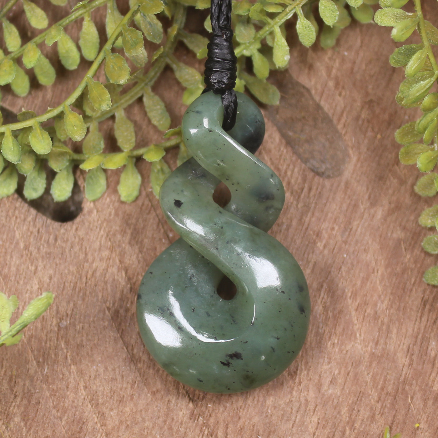 Twist or Pikorua carved from Hapopo Pounamu - NZ Greenstone