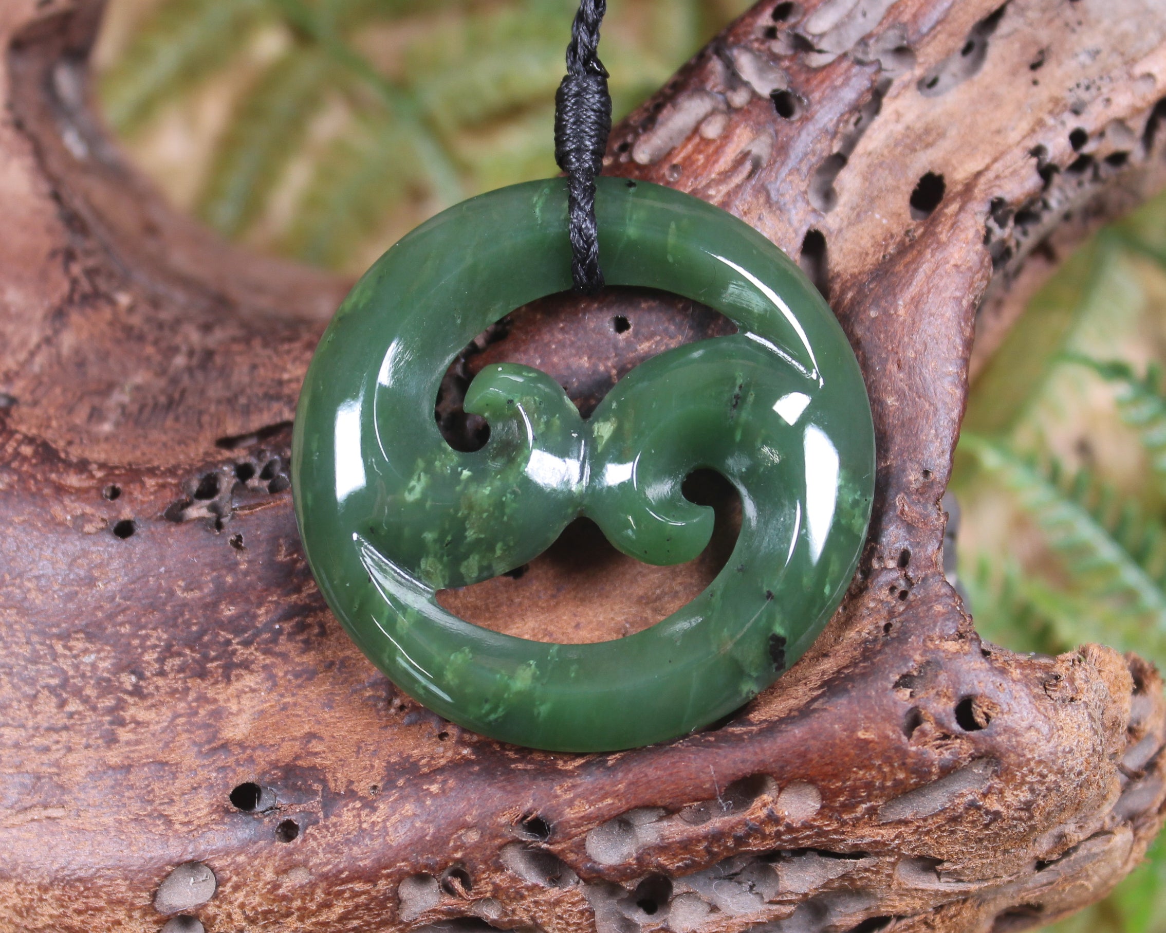 Koru pendant carved from Kawakawa Pounamu - NZ Greenstone