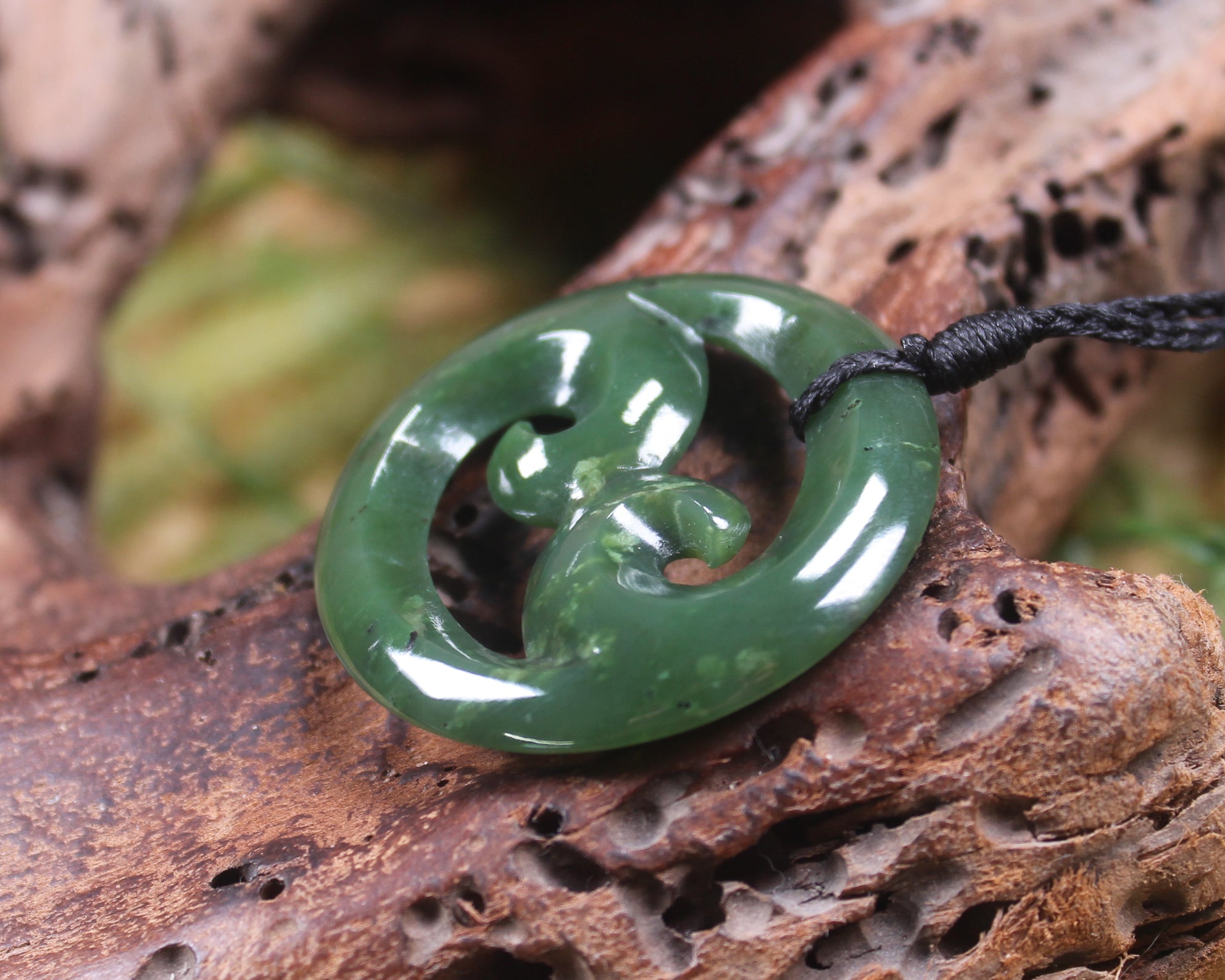 Koru pendant carved from Kawakawa Pounamu - NZ Greenstone