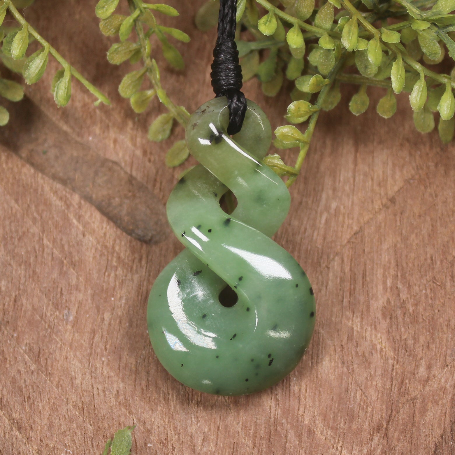 Twist or Pikorua carved from Hapopo Pounamu - NZ Greenstone