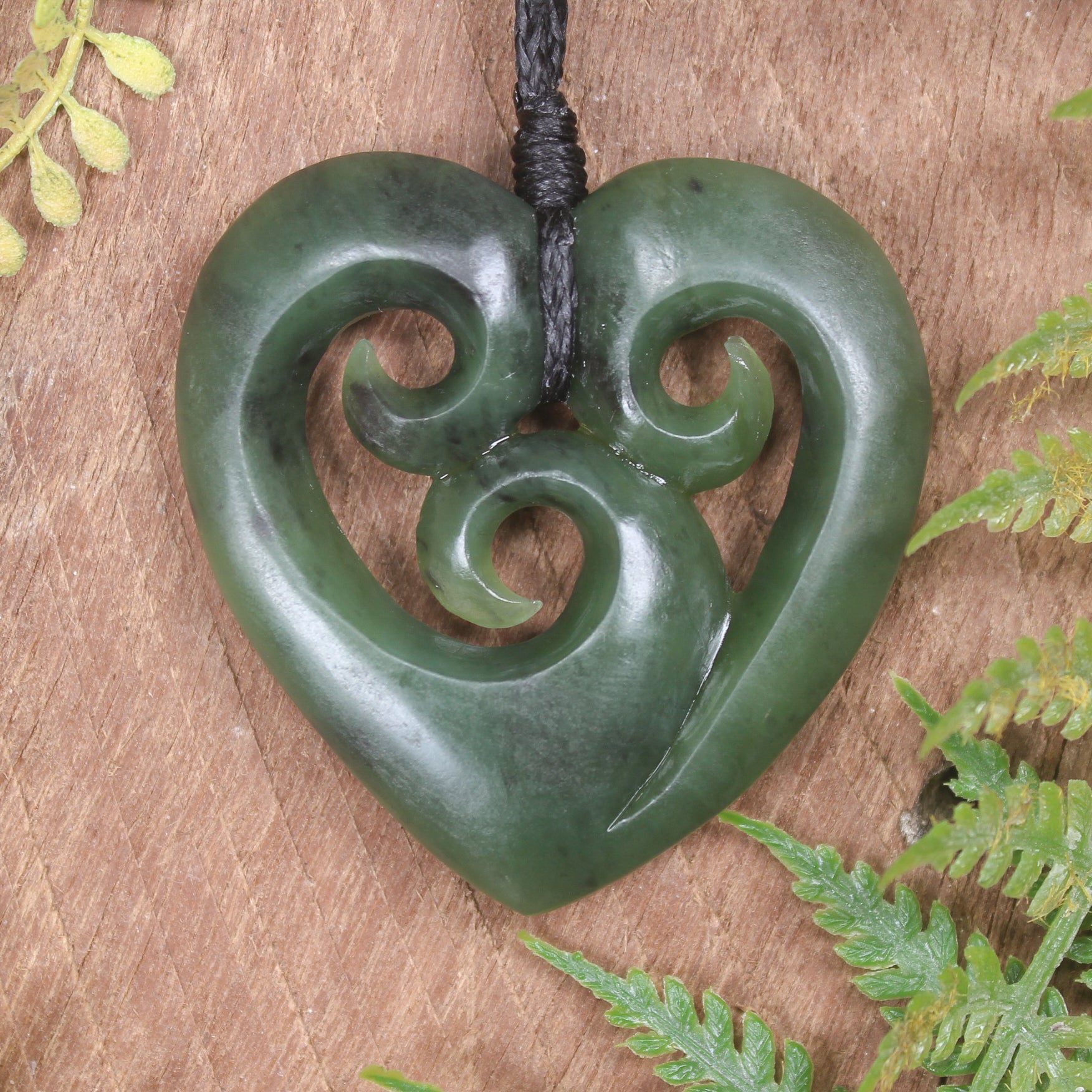 Heart with Koru carved from Hapopo Pounamu - NZ Greenstone