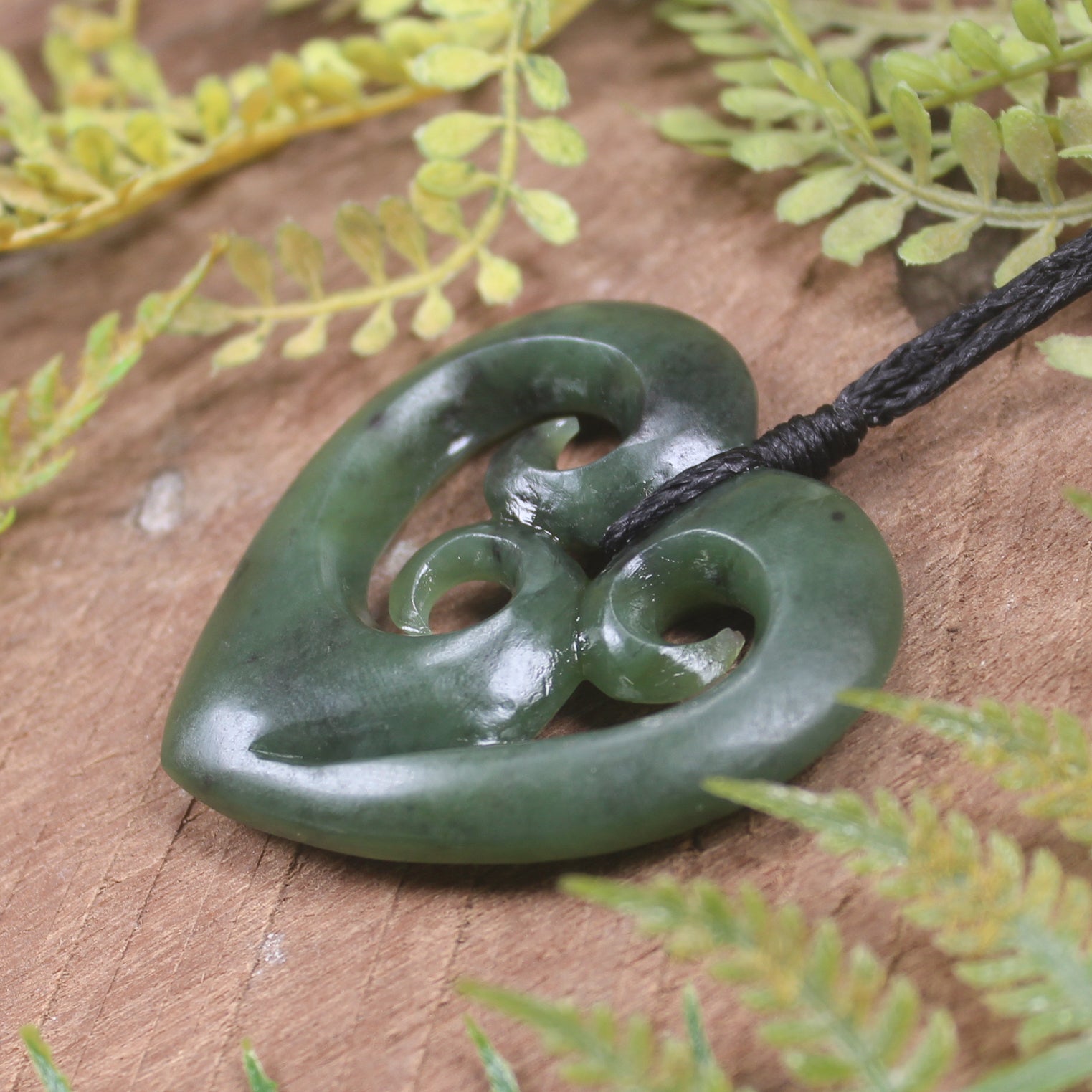 Heart with Koru carved from Hapopo Pounamu - NZ Greenstone