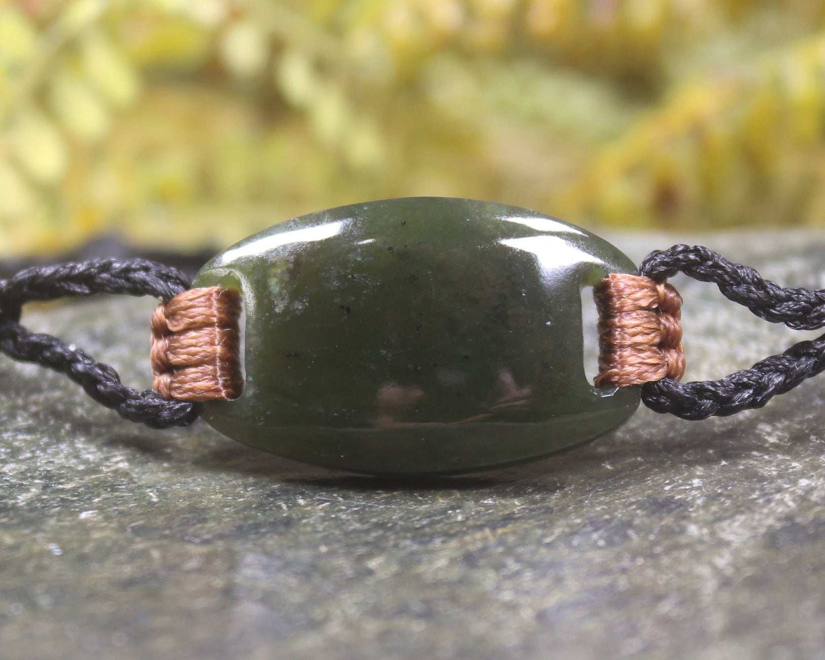 Adjustable cord bracelet with Rimu Pounamu