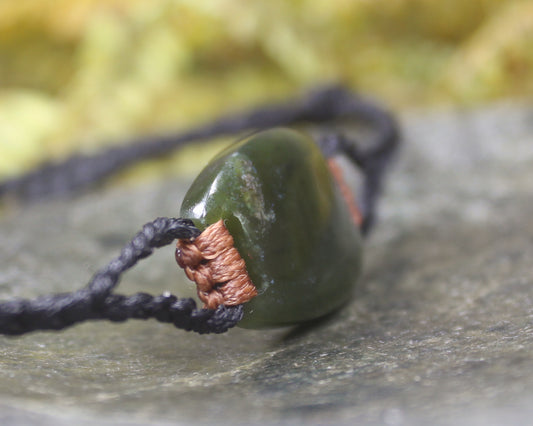 Adjustable cord bracelet with Rimu Pounamu