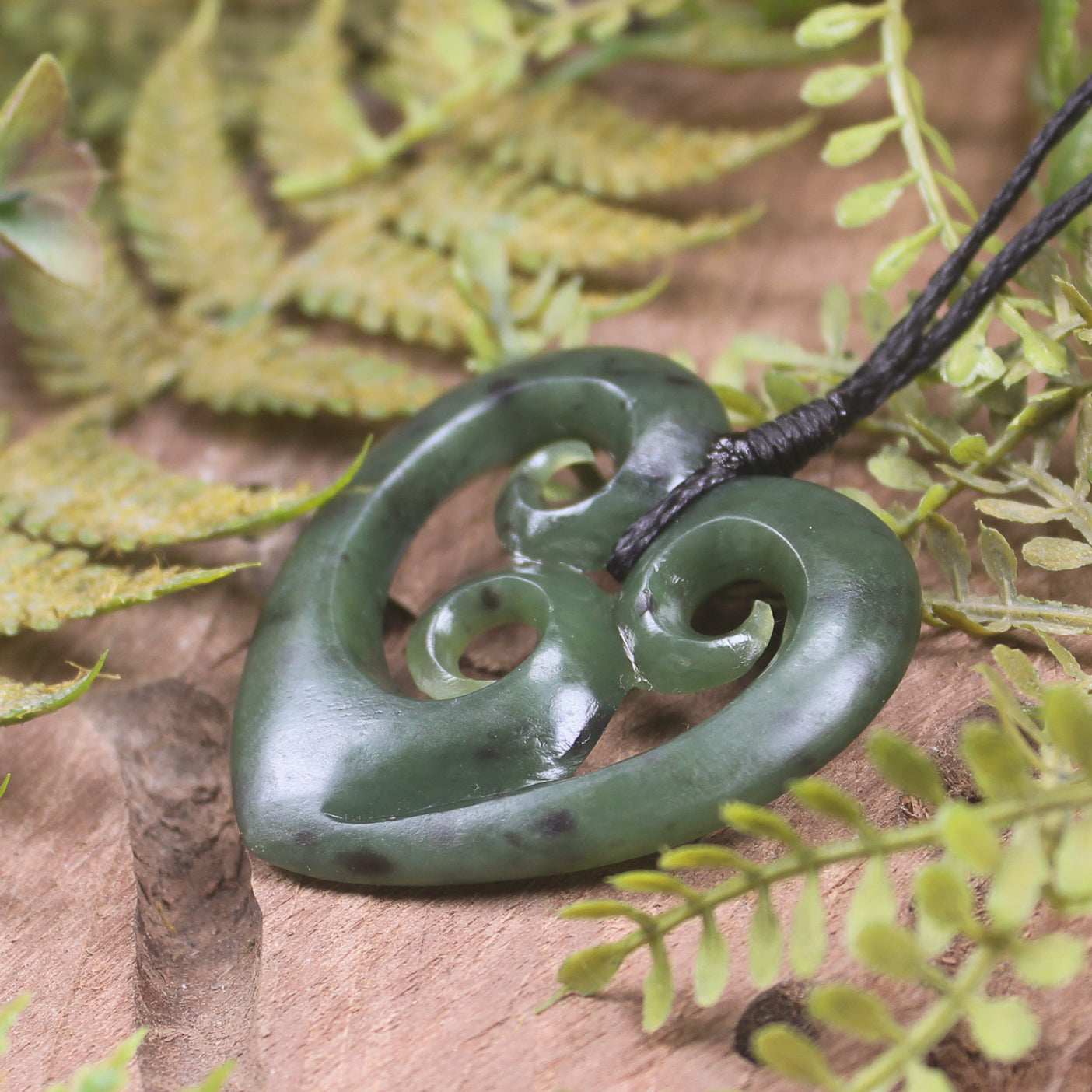 Heart with Koru carved from Hapopo Pounamu - NZ Greenstone