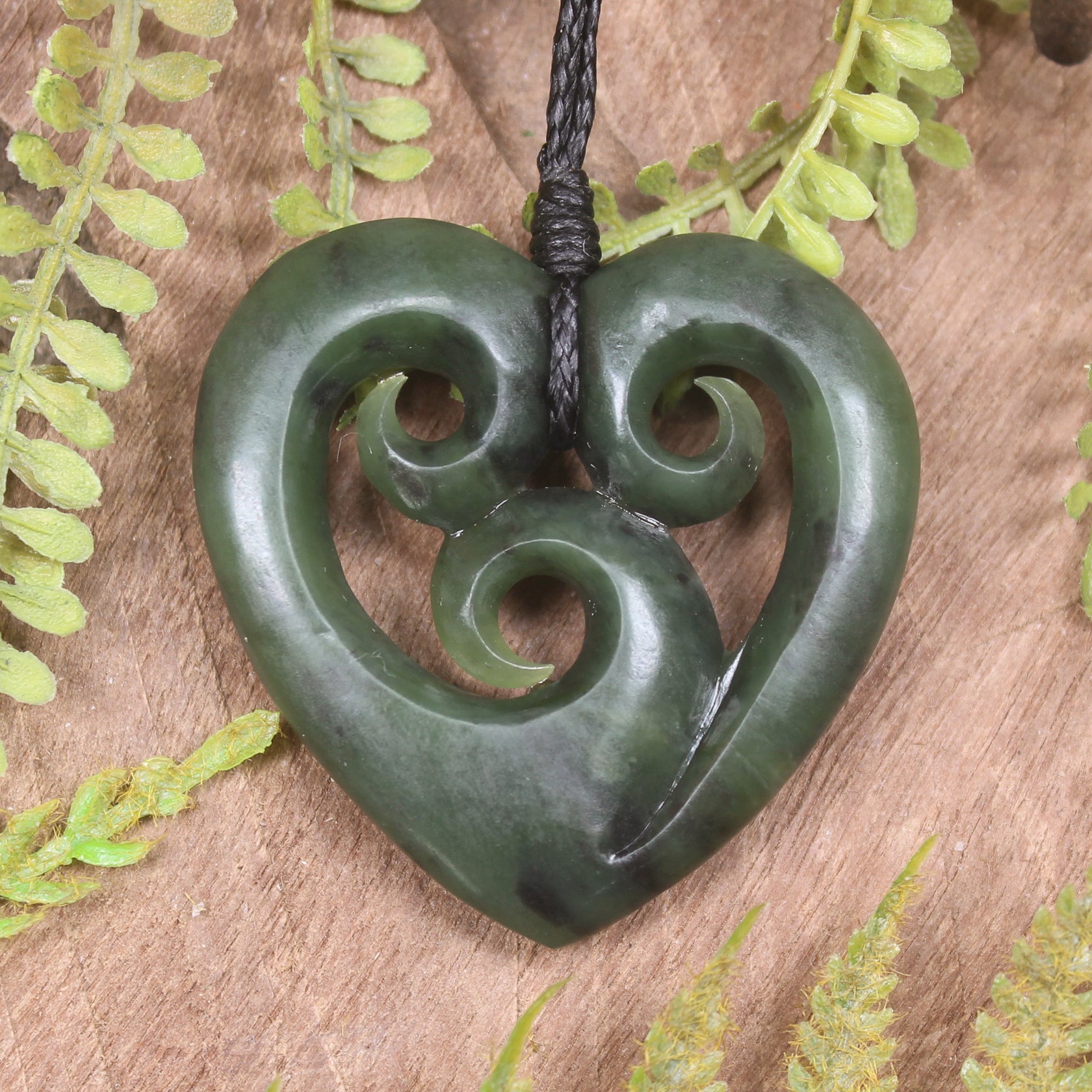 Heart with Koru carved from Hapopo Pounamu - NZ Greenstone