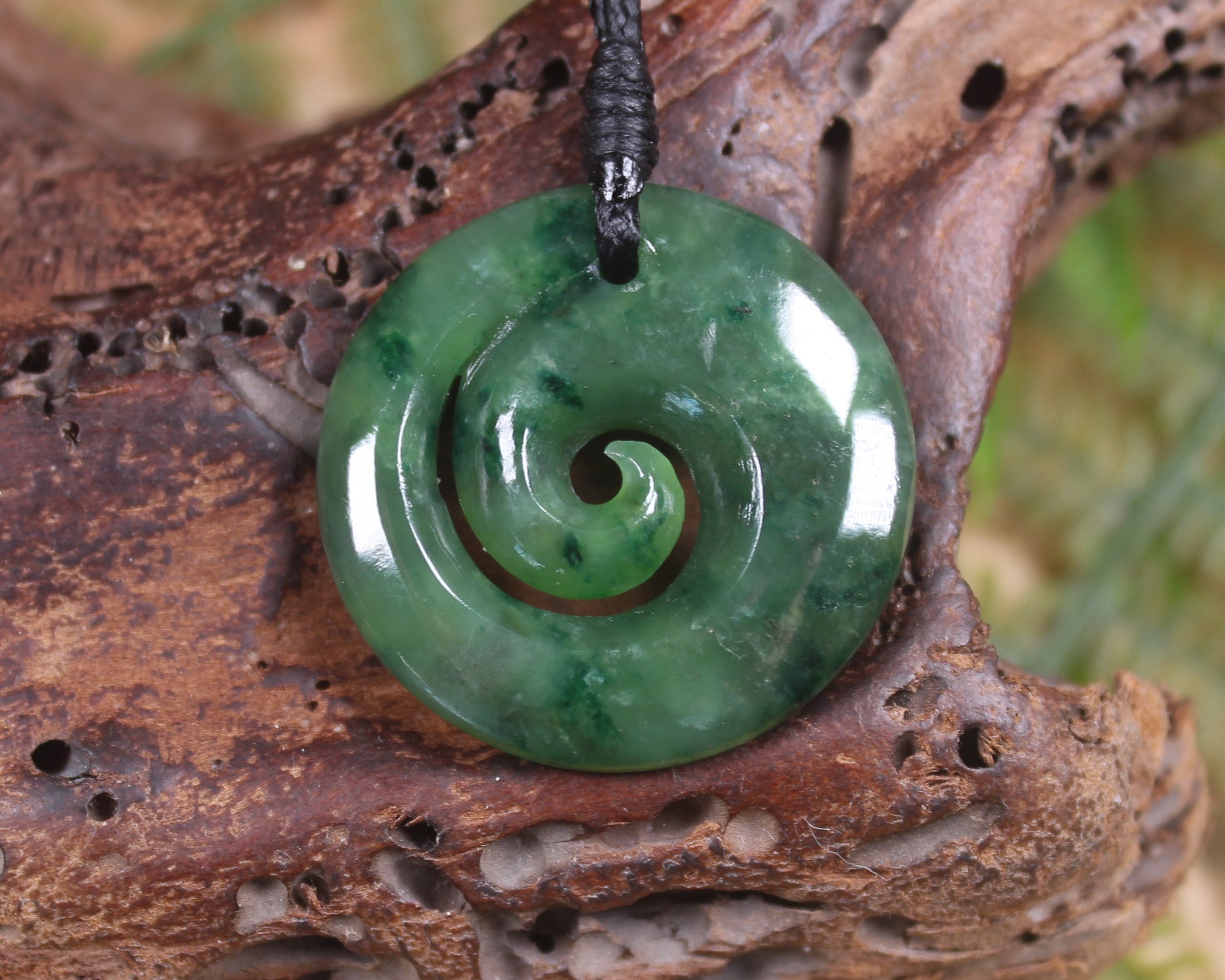 Koru pendant carved from Kawakawa Pounamu - NZ Greenstone