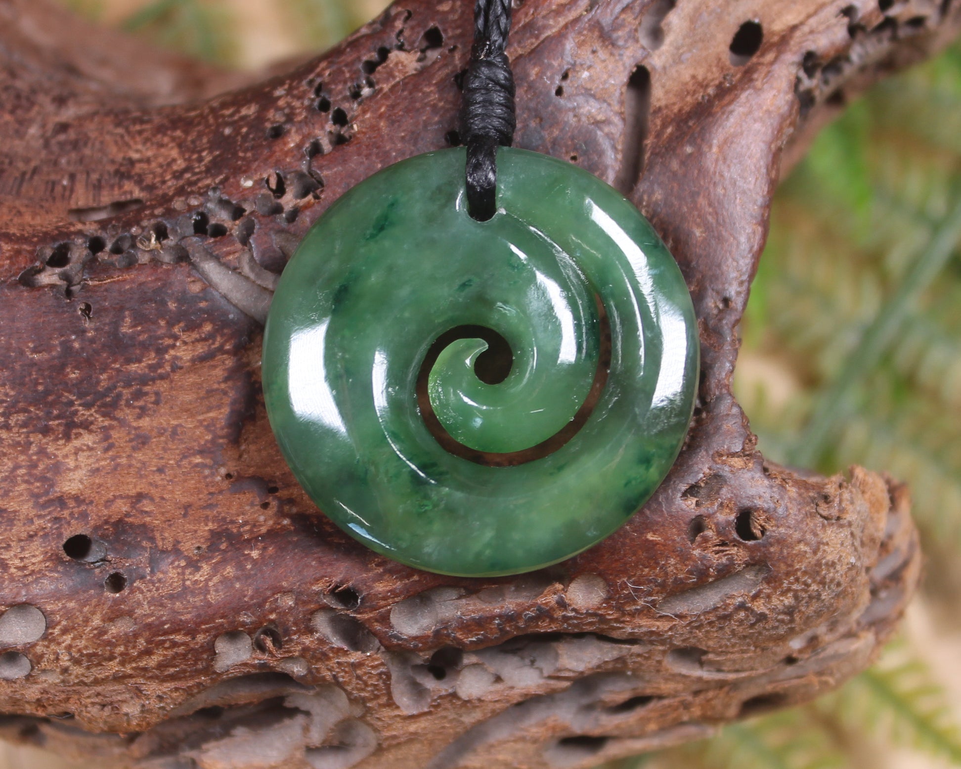 Koru pendant carved from Kawakawa Pounamu - NZ Greenstone