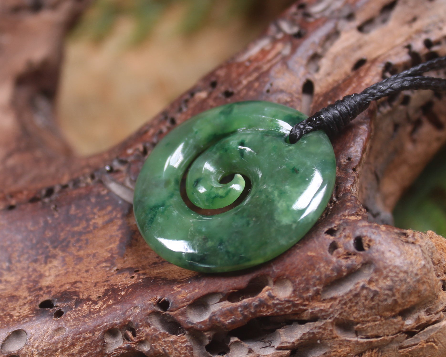 Koru pendant carved from Kawakawa Pounamu - NZ Greenstone